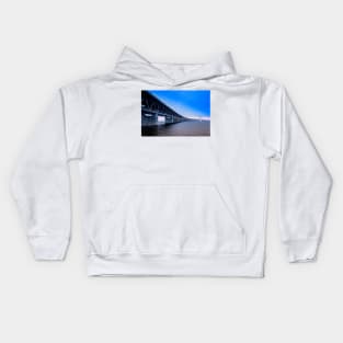 In the colorful evening light lies the Öresund Bridge, which connects Sweden and Denmark Kids Hoodie